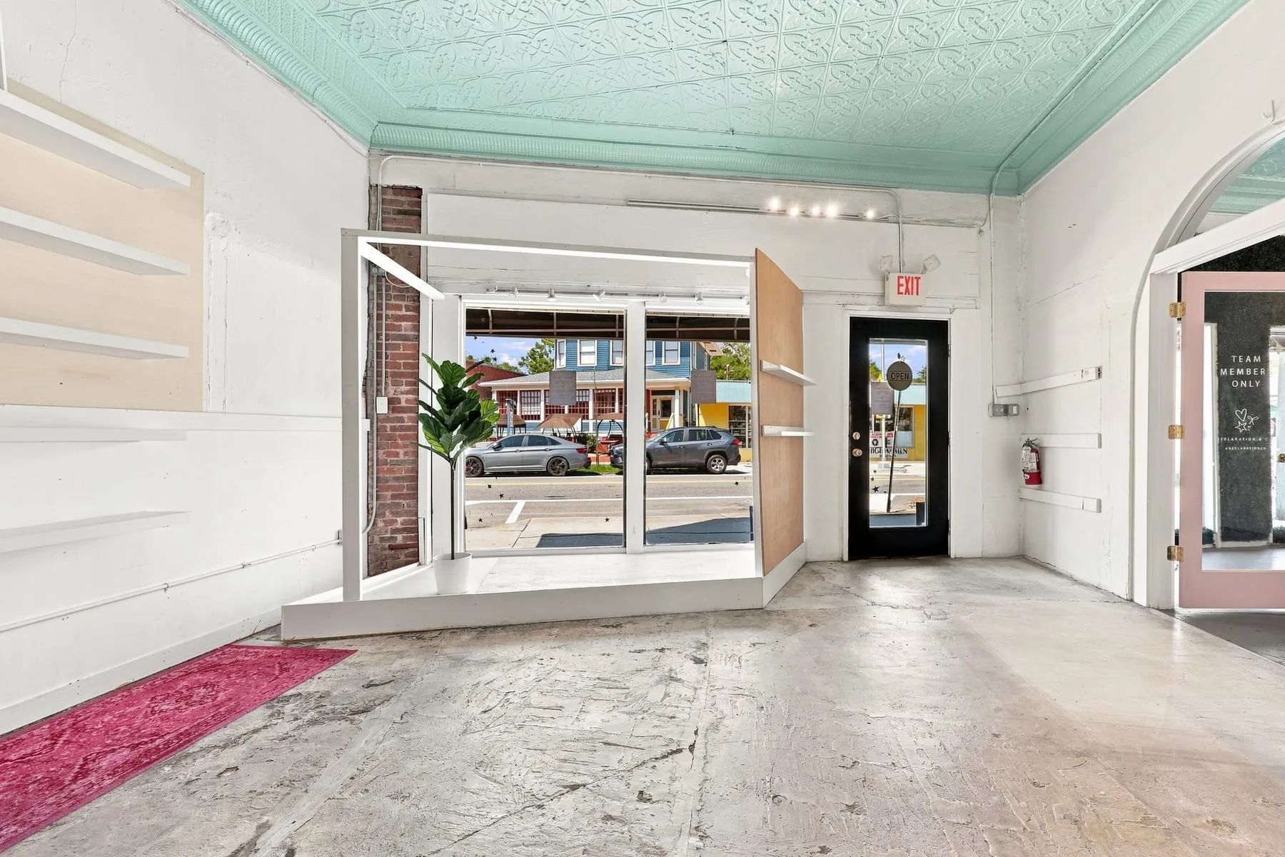 Interior view from the retail floor looking out through the entry to San Marco Avenue